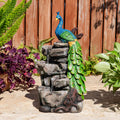 Glitzhome Outdoor Water Fountain with Lights, 4-Tierd Peacock W/Stacked Stone Outdoor Fountain, 20.5' H Polyresin Decorative Waterfall Feature Garden Fountain with Pump for Garden, Patio, Porch